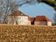 Renovatie met oude tegeldakpannen en boomse dakpannenVillaMortsela